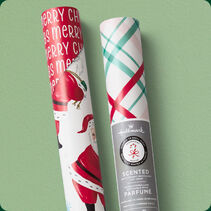 Two rolls of Christmas wrapping paper