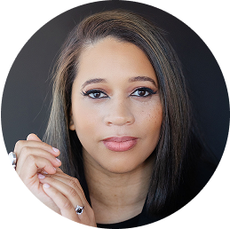 Headshot of Rachel Marie Kang on a dark gray background