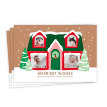 Flat card with whimsical illustration of a red, pink and green home set in a snowy scene with places for your favorite photos in the windows. 