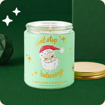 Lidded Christmas-themed candle
