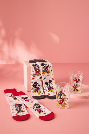Socks and drinkware on a pink background