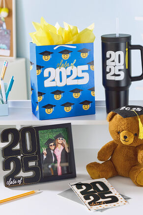 Class of 2025 mug, stuffed bear, picture frame, gift wrap and card.