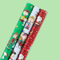 Holiday gift wrap with Peanuts designs. 