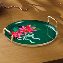 Metal tray with gold handles, featuring pink and red poinsettia blooms and a blue bow on dark green.