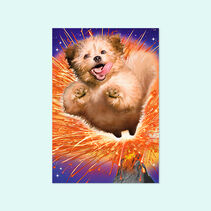 Greeting card cover with dog joyfully bursting out of a volcano surrounded by a colorful shower of sparks