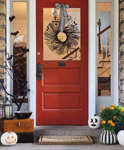 Front stoop decorated for Halloween.