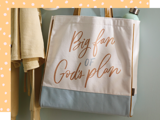 Tote bag that reads "Big fan of Gods plan"