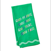 Bright green tea towel with embroidered message "Good friends, good food, good talks, good times."