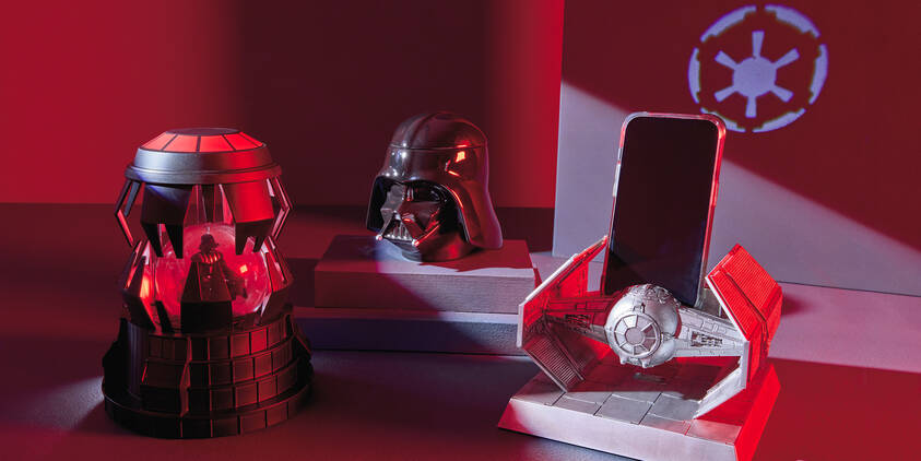 Products inspired by the Dark Side, including Darth Vader and tie fighter figurines