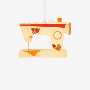 Vintage sewing machine ornament.